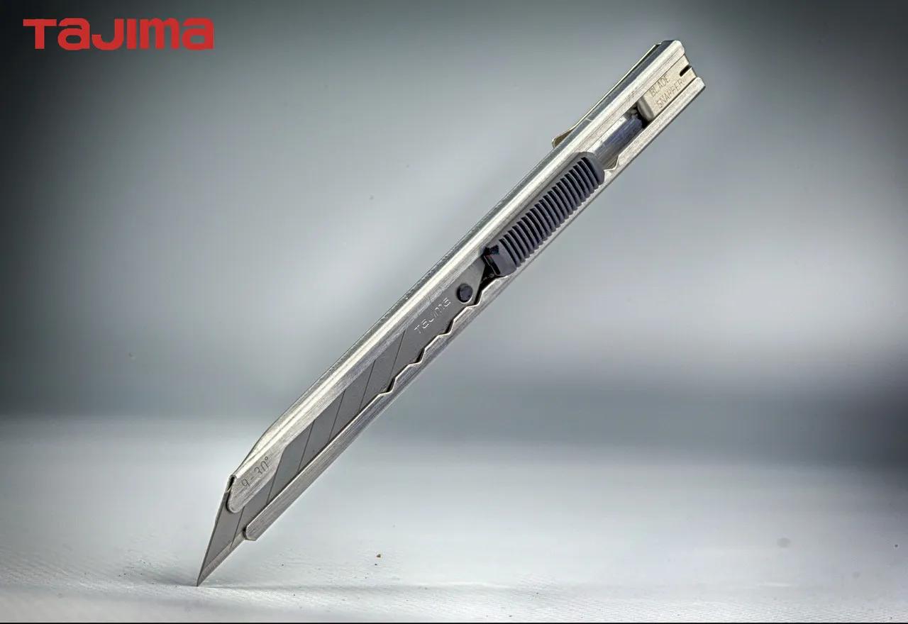 Нож строительный 9 мм TAJIMA (Япония) LC390B угол 30° автоматический фиксатор - 134735